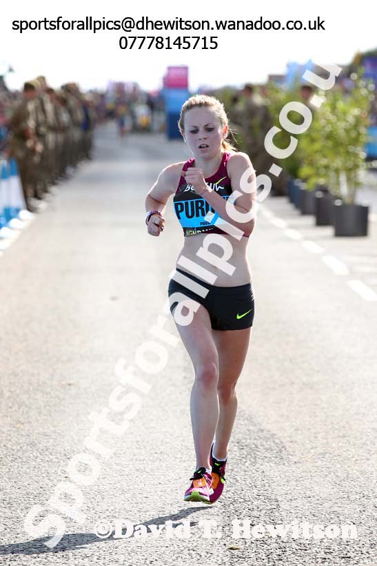 Charlotte Purdue finishing the womens 2014 BUPA Great North Run. Photo: David T. Hewitson/Sports for All Pics